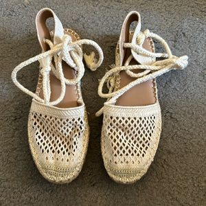Cream colored espadrille flat sandals